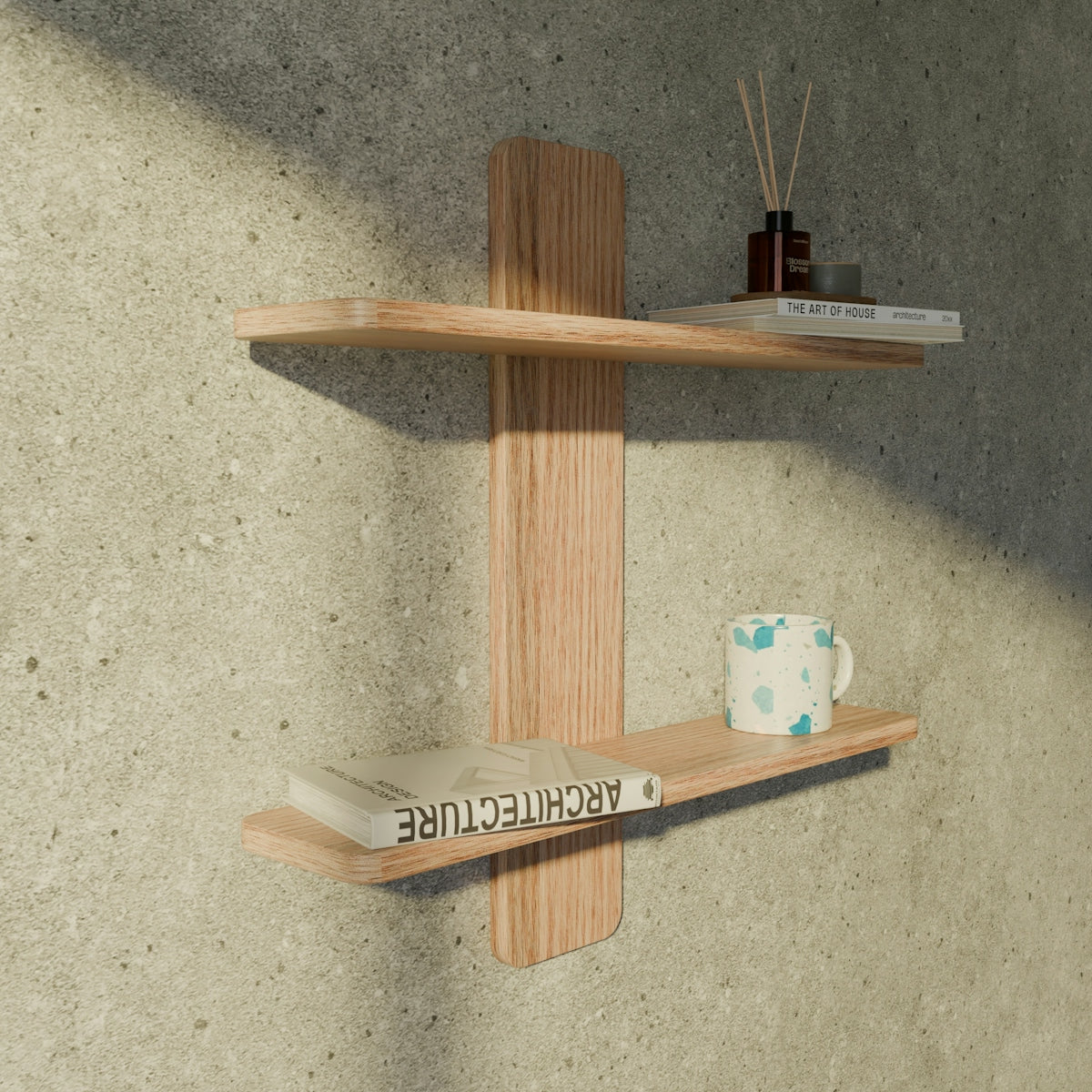 A wooden wall shelf with books, a mug, and a reed diffuser